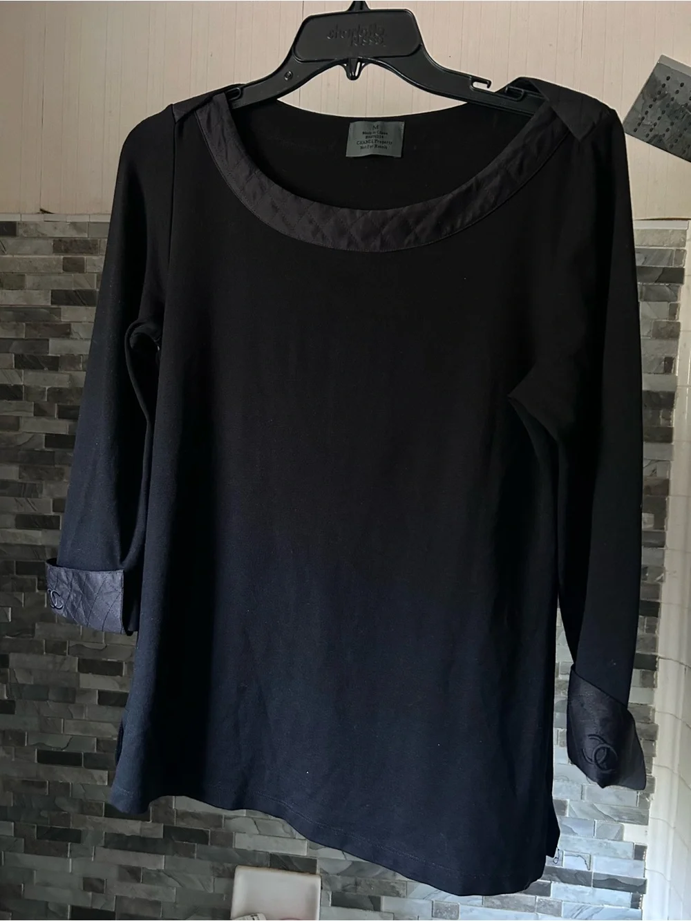 CHANEL black quilted boatneck employee uniform top